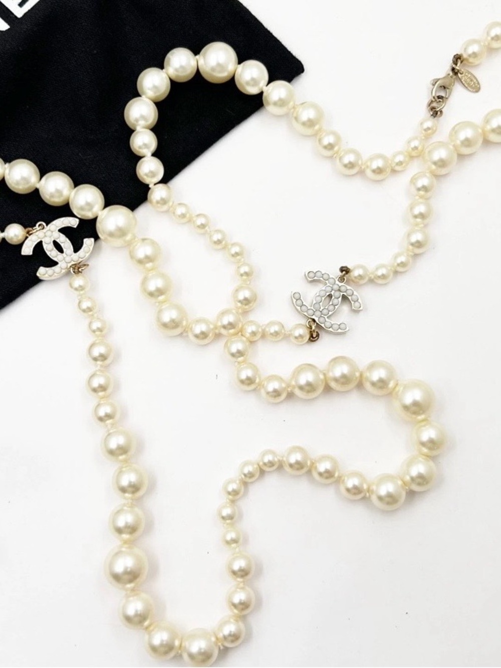 CHANEL Ivory Faux Pearl Long Necklace with CC Logo Charms